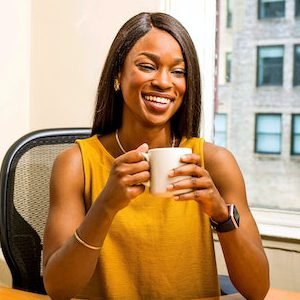 smiling woman have a cup of coffee