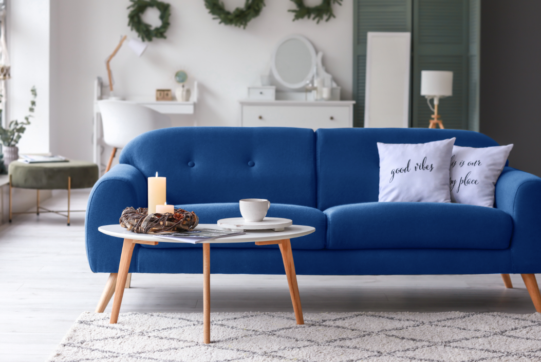 blue sofa and white floor