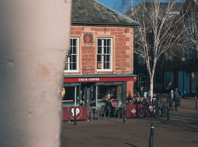Local coffee shop in a UK town centre, ideal for partnerships that support Airbnb advertising and enhance guest experiences.